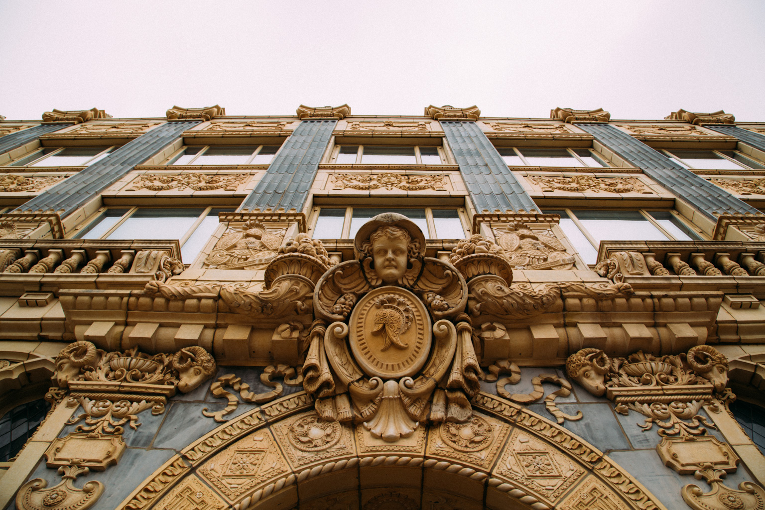 An ornately decorated building in Uptown, Chicago. The title is inspired by a quote from Lynn Becker at the Chicago Reader: "a riotous, Spanish-baroque-inspired hallucination"