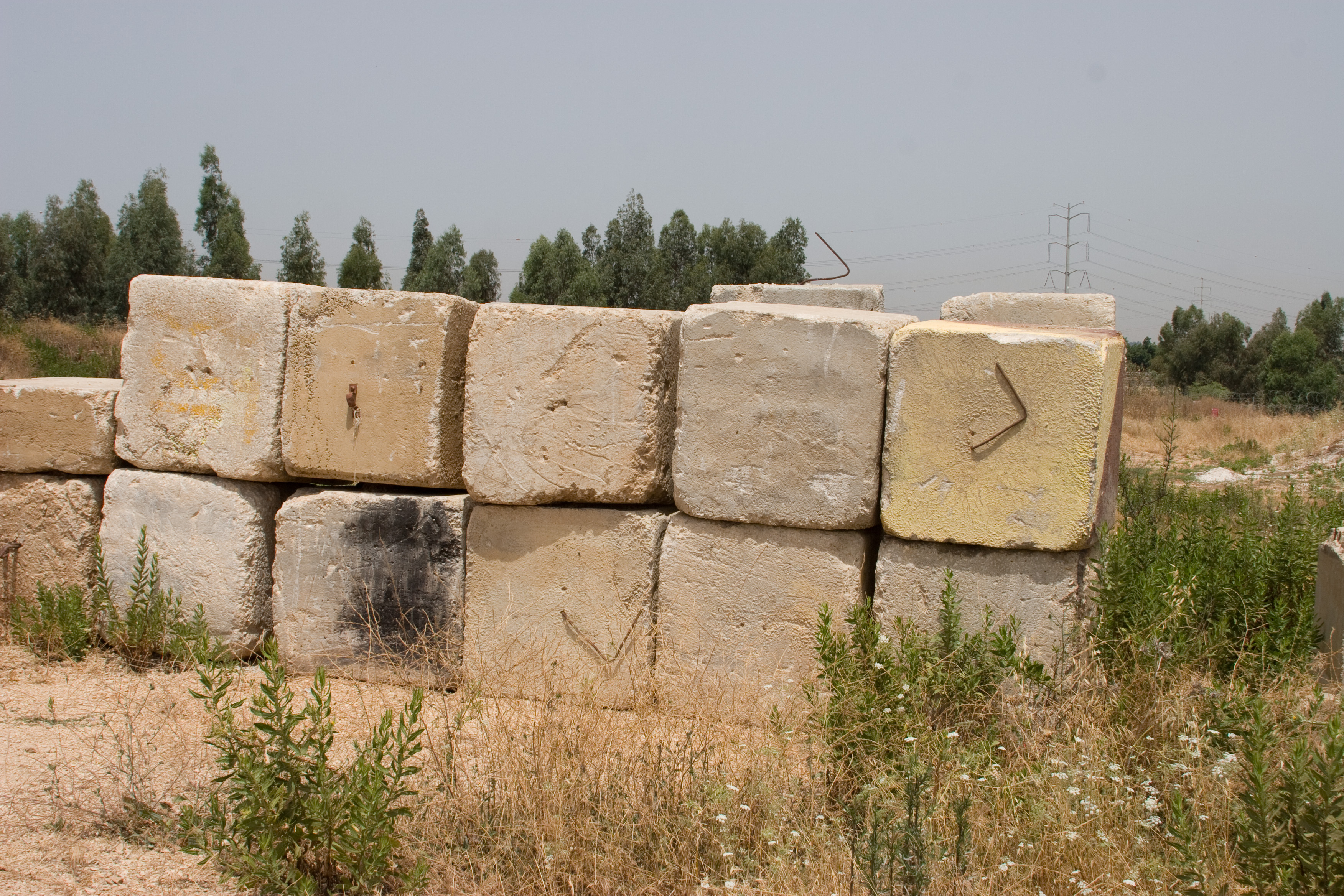 Blocks by the security wall/fence