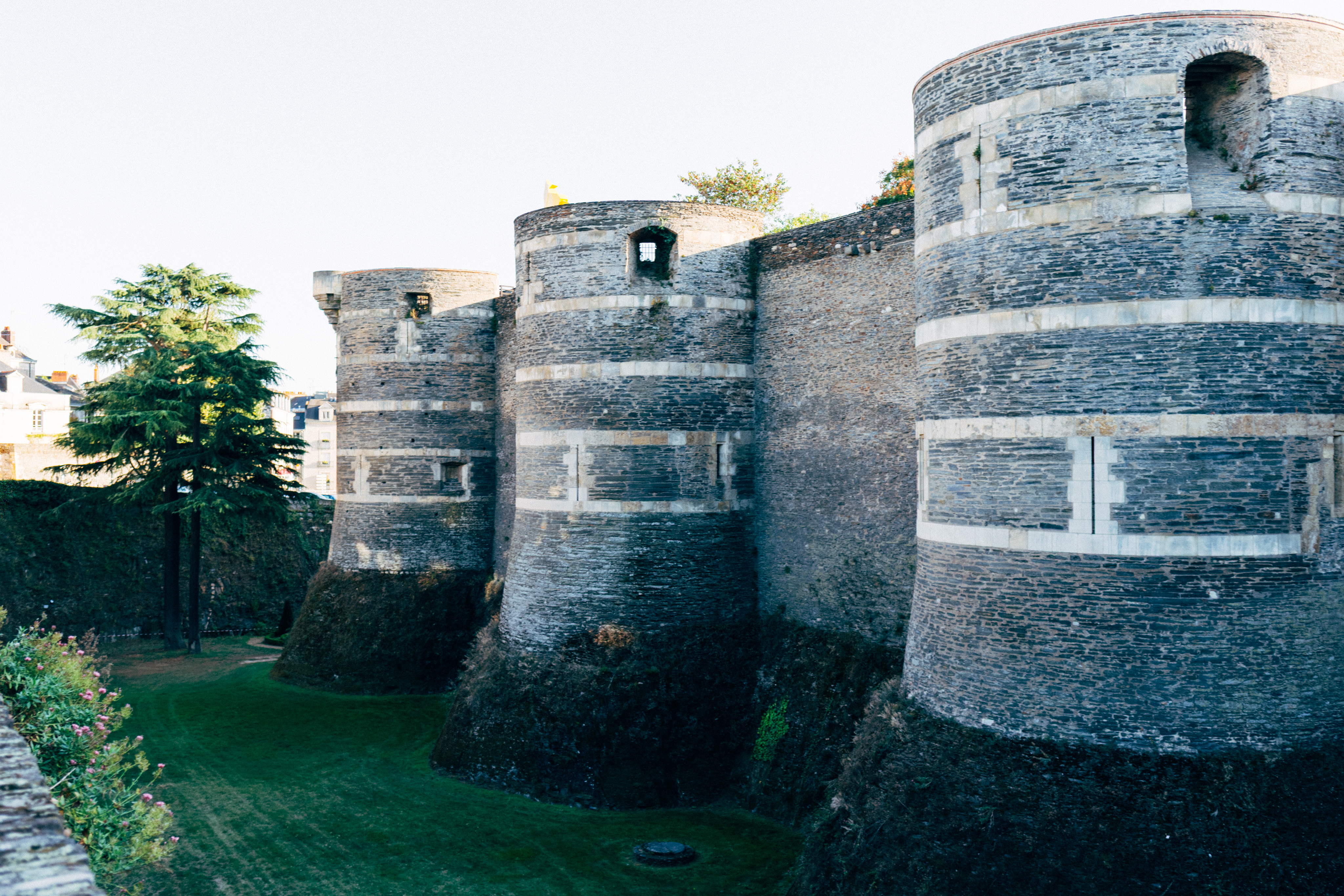 A view of the side wall and moat of the Château d'Angers
