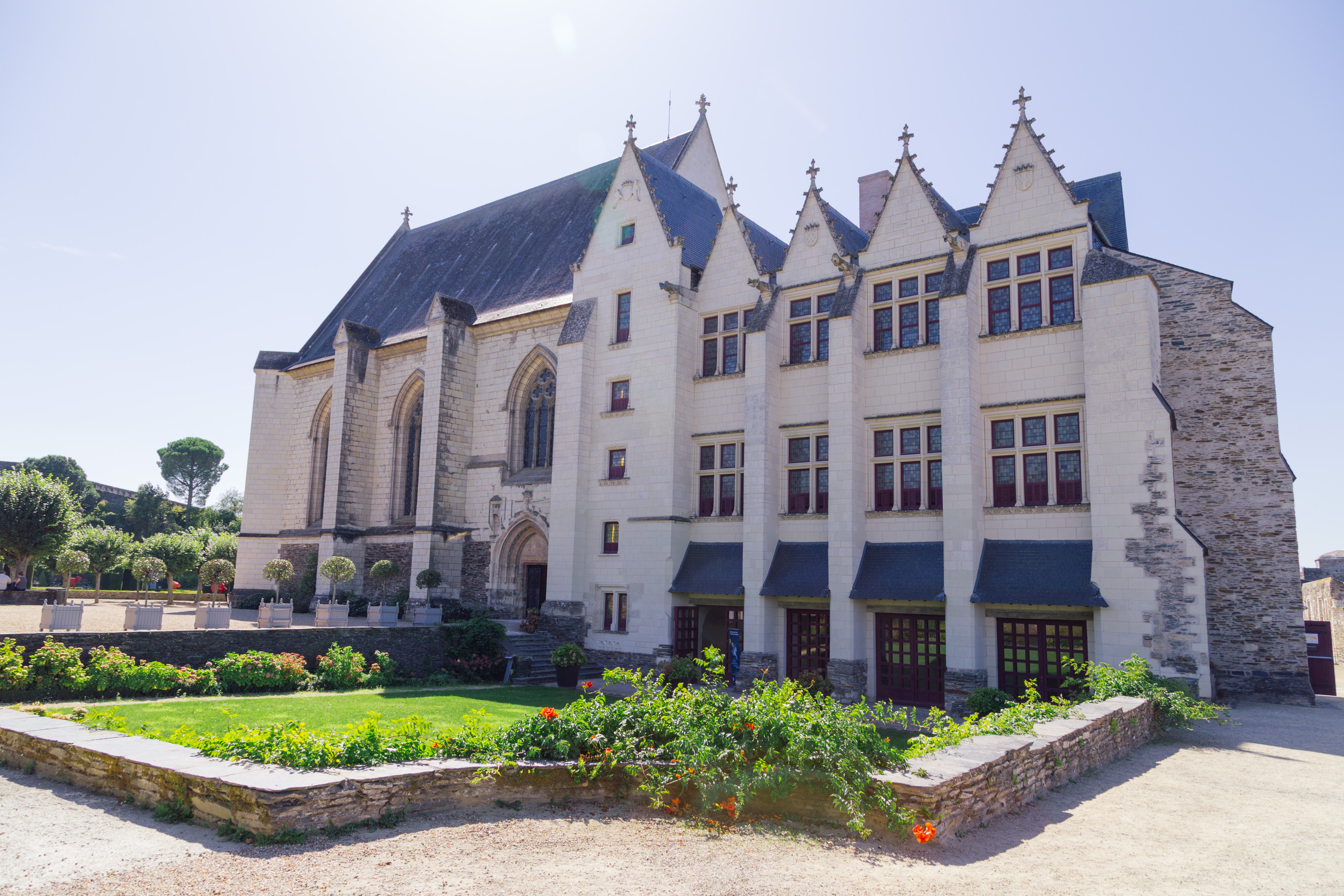 The chapel of the Angers castle stands tall in the courtyard.