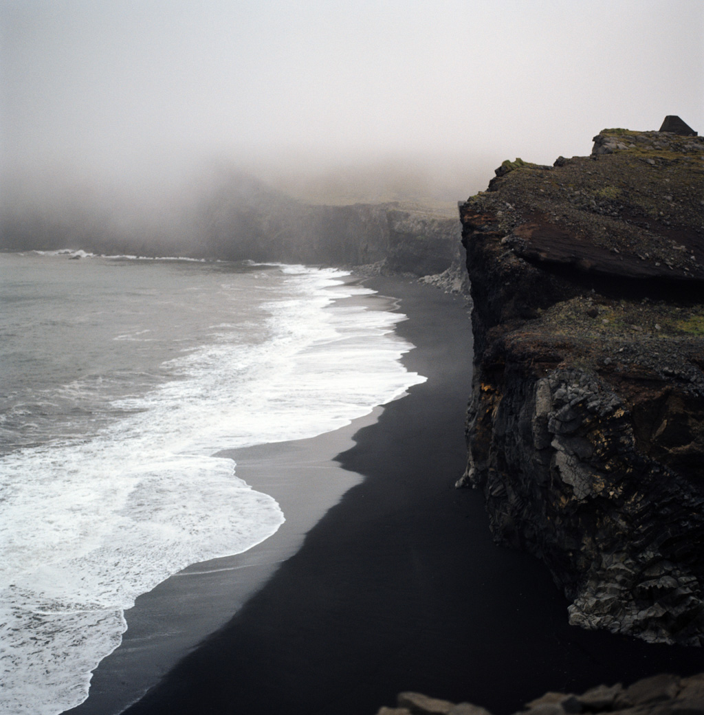 Black sand, from a cliff